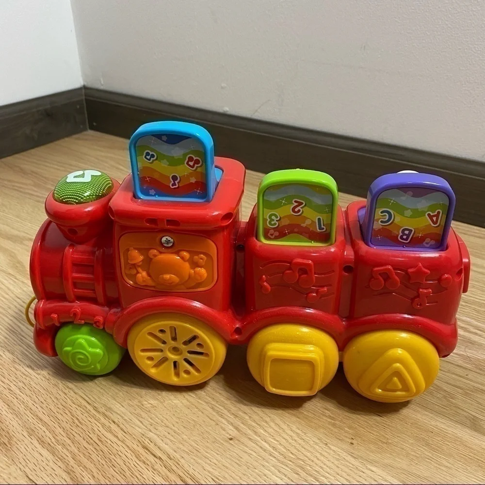 V-tech Roll & Surprise Animal Train Pop Up Music